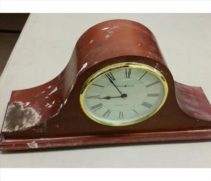 Mantle clock with fire damage 